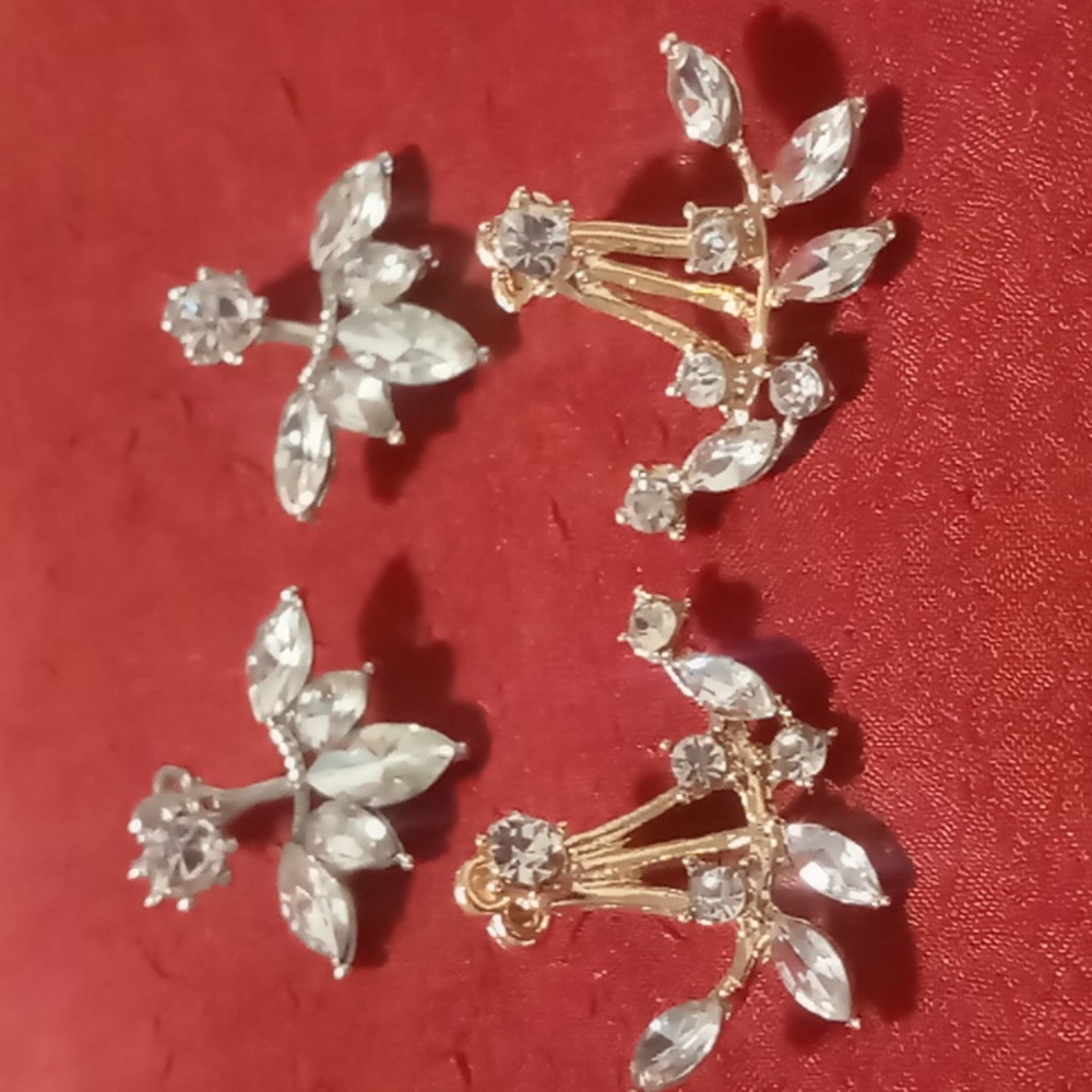 Front to back earrings 2 pair 1 in silver & 1 in gold tone crystal studs .